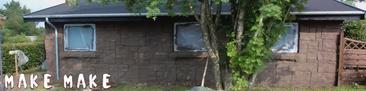 House getting a facelift with MakeMake ConcreteClay - the brickwall is transformed into a stonewall.