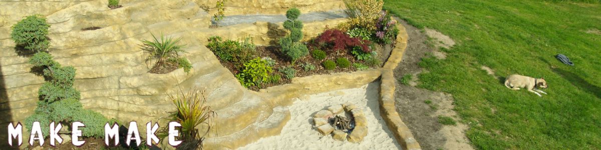 Garden with stairs and waterfall build with artificial rocks made from MakeMake Concrete Clay.