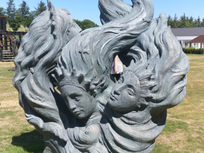 ConcreteClay sculpture of a mermaids heads