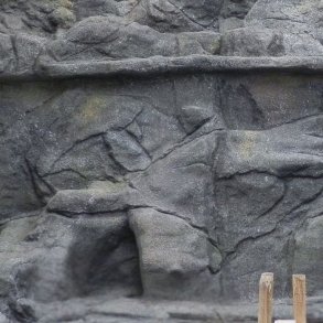 Artificial rockwall build with ConcreteClay and painted with ColourFix and pigments.