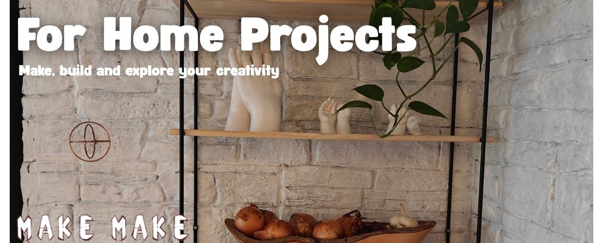 Kitchen wall made to look like raw stone wall using MakeMake ConcreteClay.