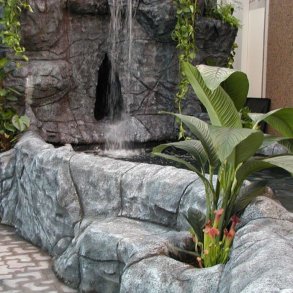 Rock formation with waterfall and pond made with MakeMake Concrete Clay.