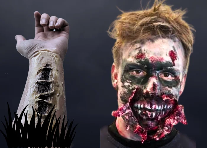 falsk sår på arm lavet med flydende latex og ansigt med falsk sår - løs blodig hud om munden og blottede tænder, samt mørke øjne og hvidt ansigt - Zombiemakeup.